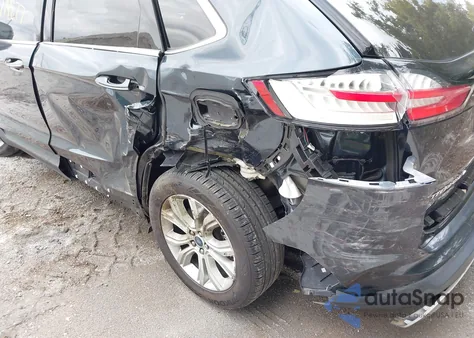 2022 Ford Edge Titanium z USA, uszkodzony, nr VIN 2FMPK4K97NBA15155